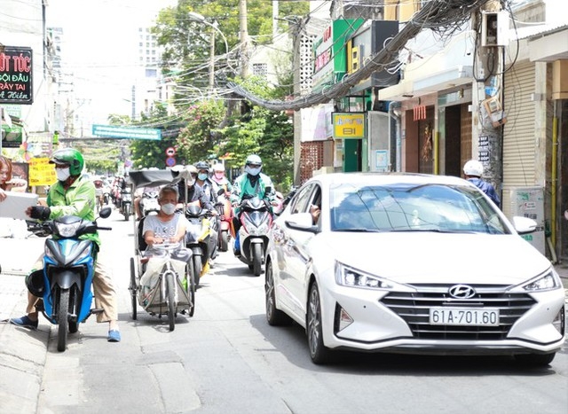  Những tuyến hẻm, con đường khang trang ở TPHCM nhờ người dân hiến đất mở rộng  - Ảnh 11.